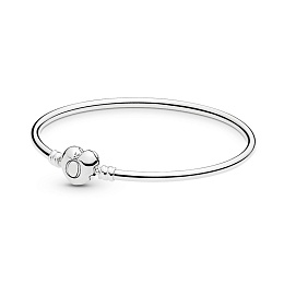 Silver bangle with heart­shaped clasp
