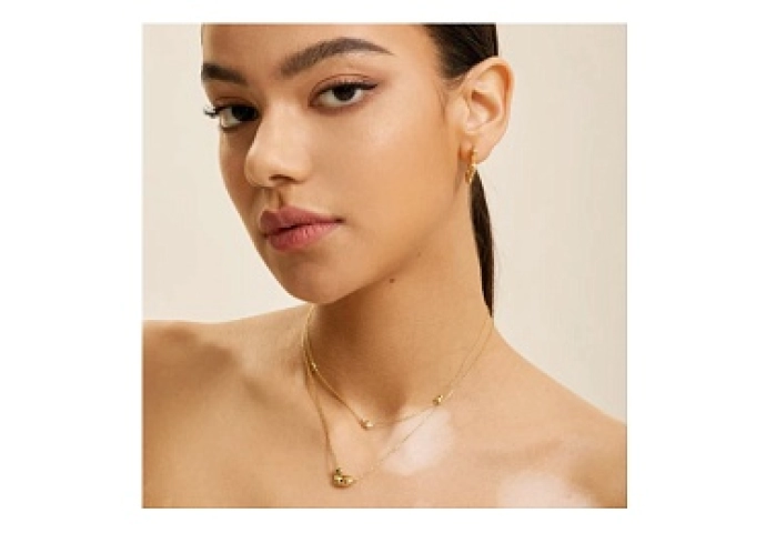 Gold Twisted Wave Hoop Earrings