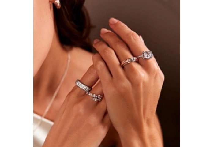 Pandora logo sterling silver and 14k rose gold-plated ring with clear cubic zirconia