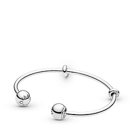 Silver open bangle with silicone stoppers and inte