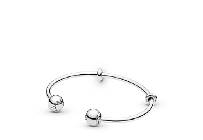 Silver open bangle with silicone stoppers and inte