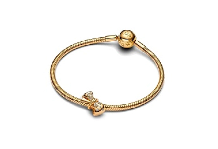 Bow 14k gold-plated charm with clear cubic zirconi