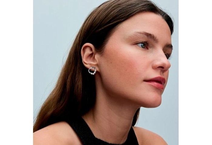 Sterling silver stud earrings with white treated f