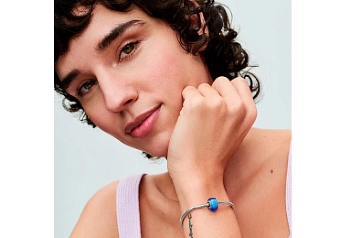 Sterling silver charm with blue Murano glass