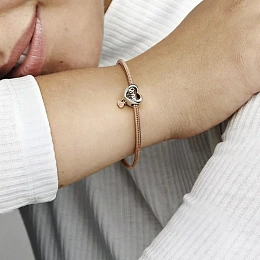 Sister sterling silver and 14k rose gold-plated charm